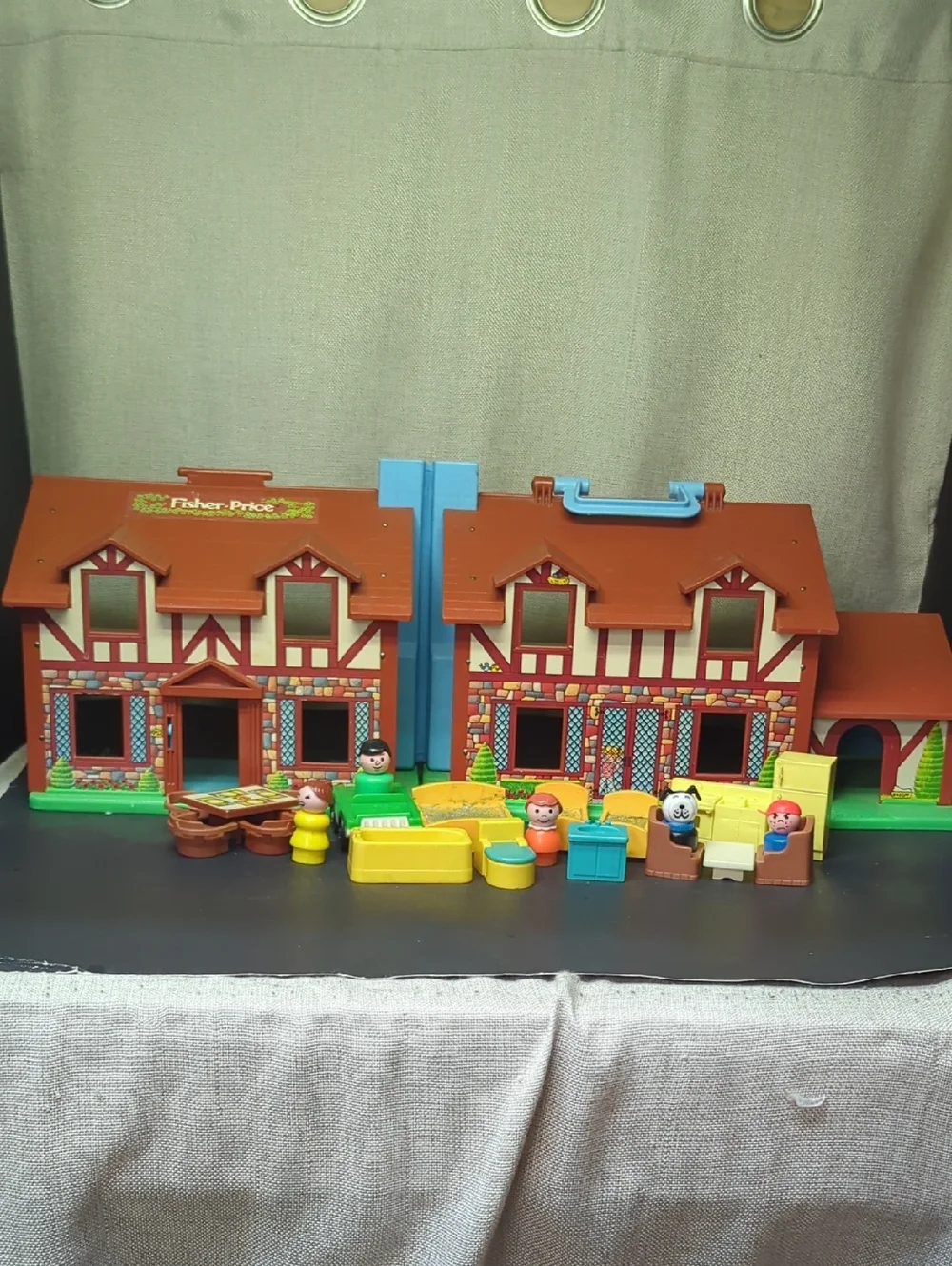 B) Fisher-Price Tudor House #952 brown & white, 2-story house complete w/Nursery